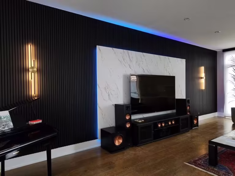 Backlit dark slatted wall panels custom built for a Northbrook residence