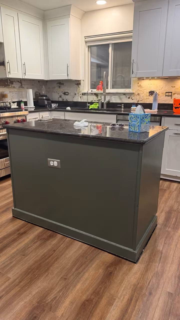 Olive green island in the white West Chicago kitchen before two-tone refacing