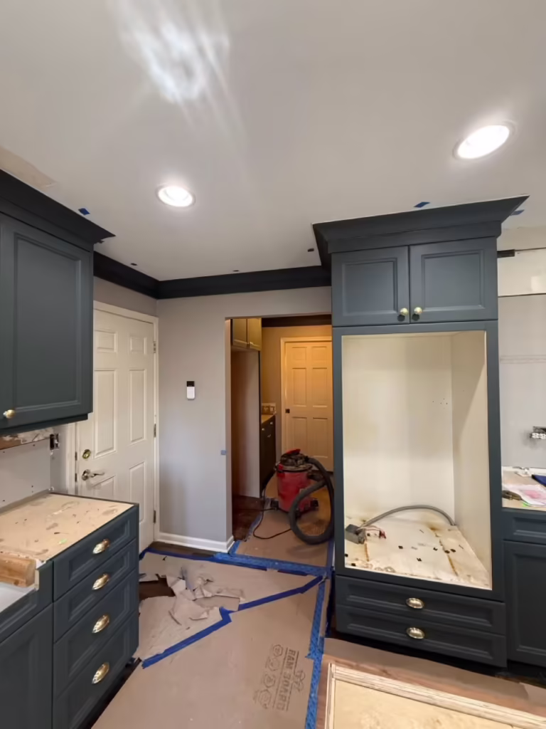 Charcoal Shaker cabinets and dark crown molding after the West Chicago refacing