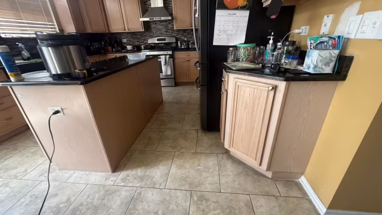 Maple peninsula and island in the open-plan kitchen before the color change
