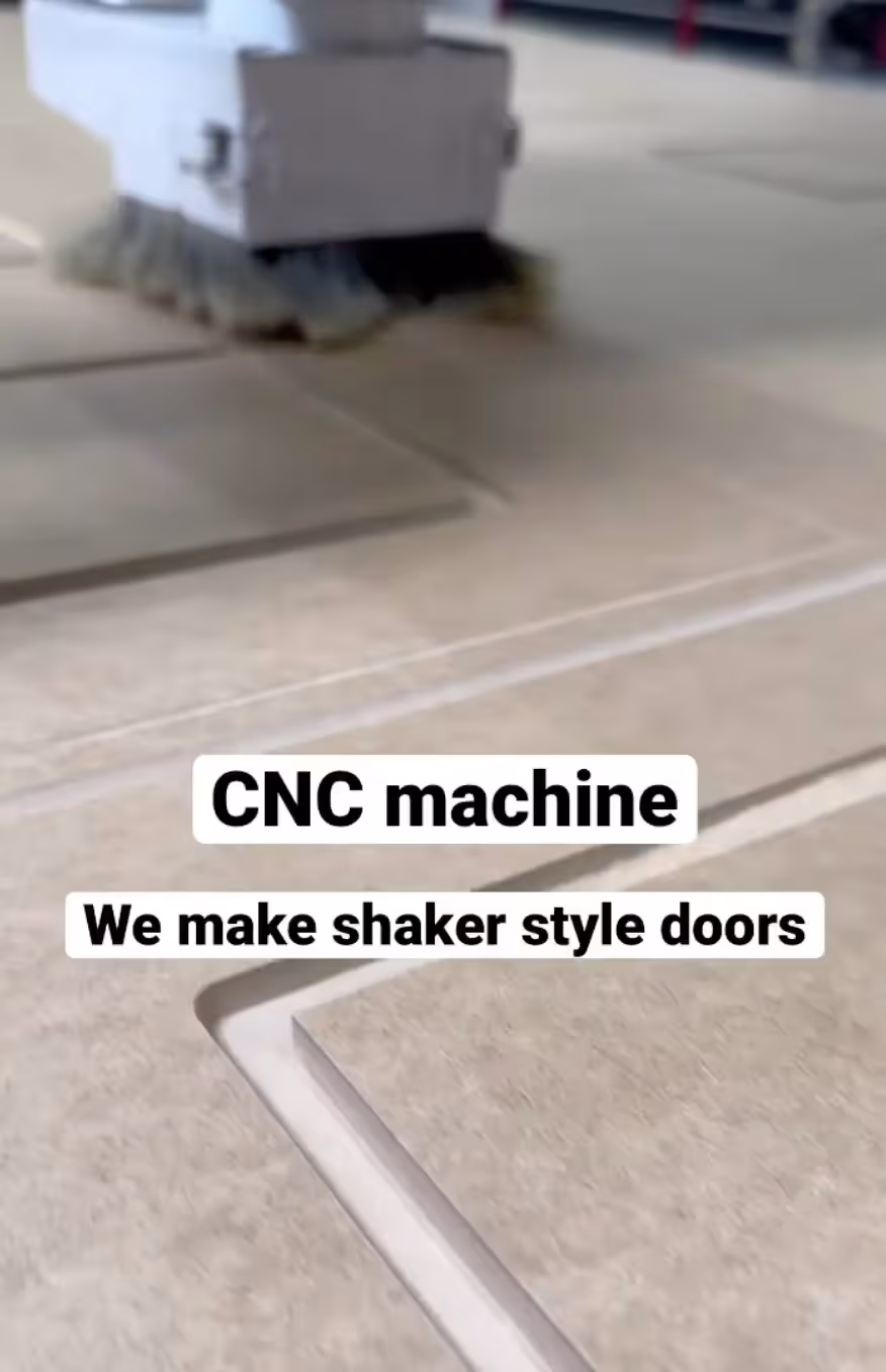 CNC machine cutting a Shaker-style cabinet door blank in the workshop
