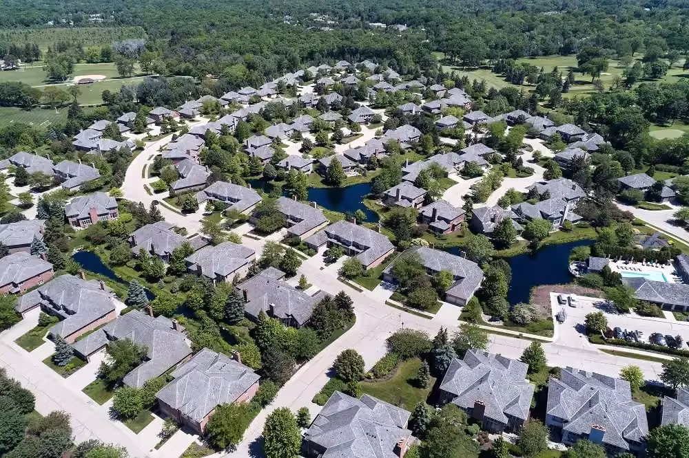 Aerial view of a Northbrook neighborhood with landscaped ponds